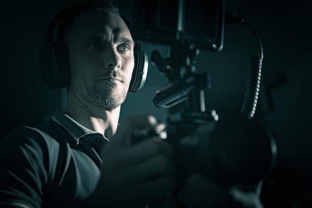 A close-up shot of a director on a movie set, intensely focused on the scene unfolding before him. He is surrounded by crew members and equipment, with a sense of creative energy and tension in the air.