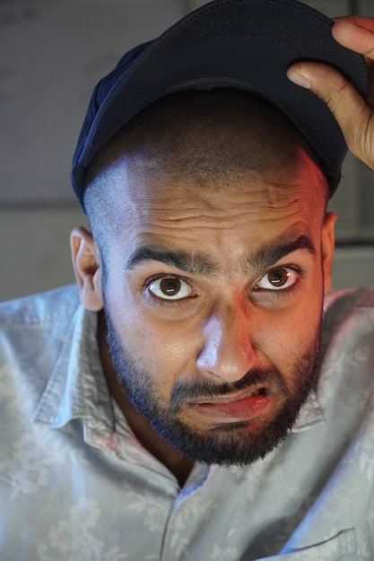 A close-up, emotionally evocative portrait of a person looking directly at the camera with a mix of sadness and hope in their eyes. The lighting is soft and the focus is on the eyes to convey vulnerability and resilience, reflecting the documentary's theme of mental health awareness.