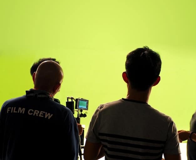 A behind-the-scenes photo of a film set in Brazil, showing the director, actors, and crew working on a scene. The image conveys the energy and collaborative nature of filmmaking.