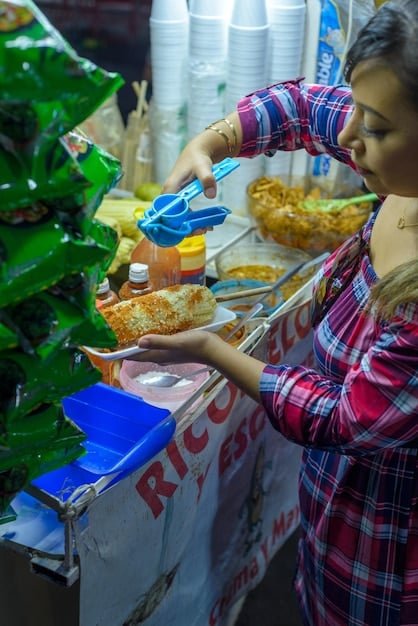 A bustling market or fair associated with a Brazilian film festival, showcasing local crafts, food, and cultural products, demonstrating the event's broader economic impact.